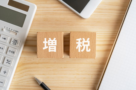 Wooden blocks with "zozei" text of concept on the table.の写真素材