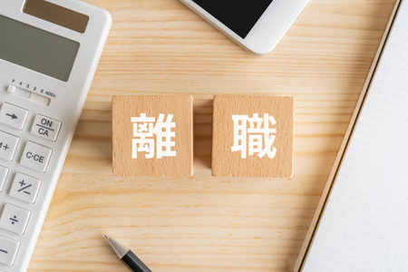 Wooden blocks with "risyoku" text of concept on the table.の写真素材