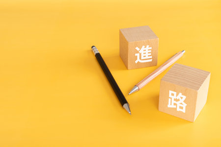 Wooden blocks with "shinro" text of concept and pens.の写真素材