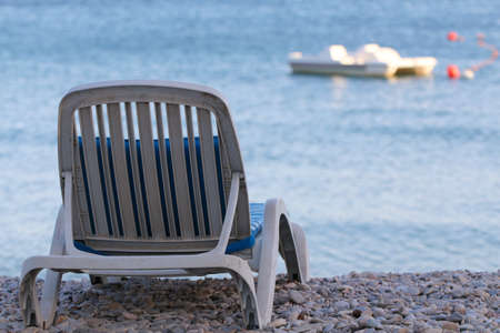 Sunbed on the beach. Sunbed on a tropical beach. Summer Vacation