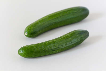 Fresh cucumbers isolated on white. Cucumbers isolated on white background.の写真素材