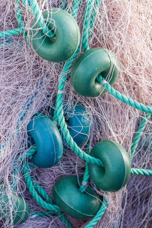Fishing nets closeup. Background of fishing nets and floats.