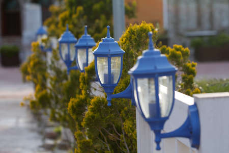 Blue streetlights. Blue garden lantern. Classic old garden lamp.の写真素材