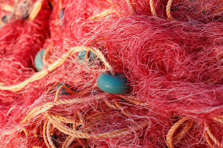 Fishing nets closeup. Background of fishing nets and floats.の写真素材