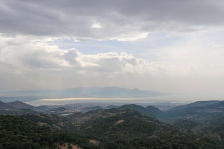 Panorama with modern buildings and mountains. Izmir city, Turkey.の写真素材