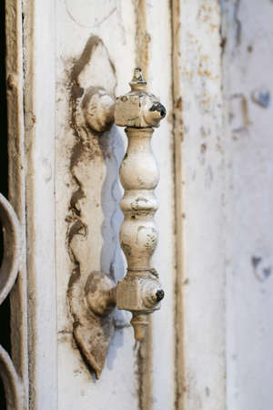 Old antique white door handle.の写真素材