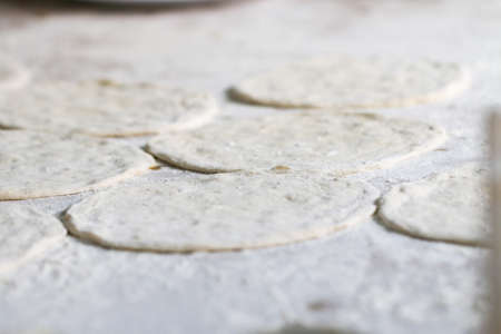 Raw sweet yeast dough. Preparation for baking.の写真素材