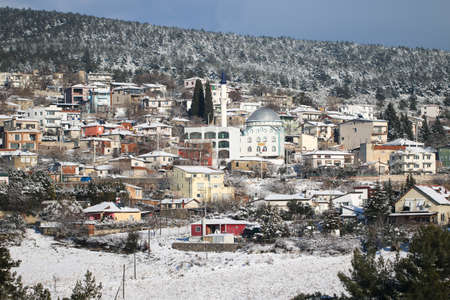 Houses with roofs snow. Winter mountain landscape.の写真素材