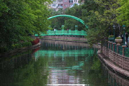View of Porsuk River in Eskisehir. Eskisehir is a modern city in the center of Anatoliathe. Reflection of the bridge in the water.の写真素材