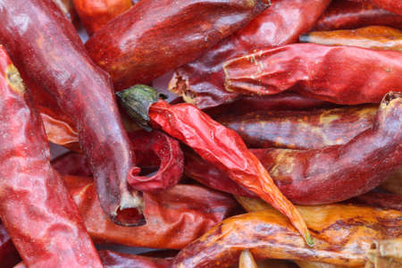 Dried red chili or chilli cayenne pepper as background.の写真素材