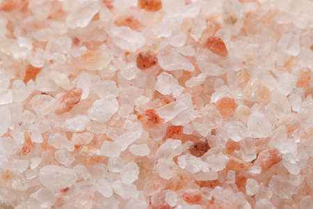Himalaya salt background and close up. Pink and orange coarse crystals.の写真素材