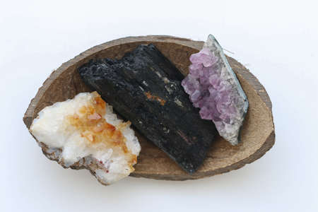 Natural amethysite, citrine and black tourmaline in coconut shell.の写真素材