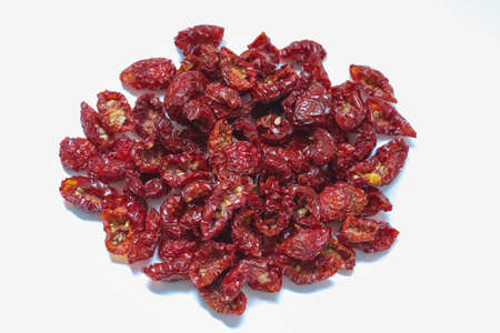 Sun dried cherry tomatoes isolated on white background.の写真素材