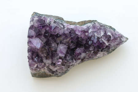 Detailed natural amethyst crystallized structure over white.の写真素材