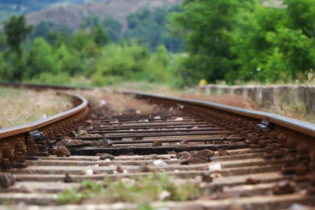 Old rails in landscape. Rails in the land.の写真素材