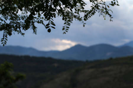 Summer landscape in mountains and the dark blue sky. with clouds