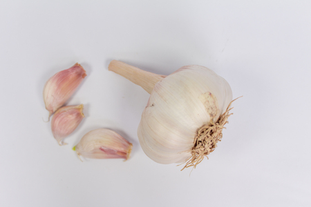 garlic isolated on white backgroundの写真素材