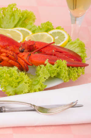 Lobster Dinner served on plater with lemonの写真素材