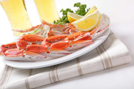 Crab legs with lemon and parsleyの写真素材