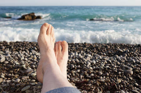 Man resting on a beachの写真素材