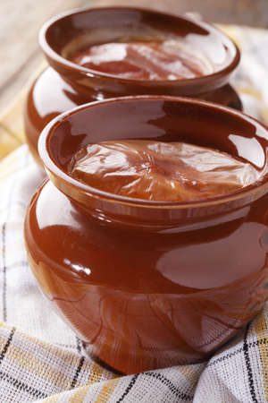 Preparation of homemade baked milk in potsの写真素材