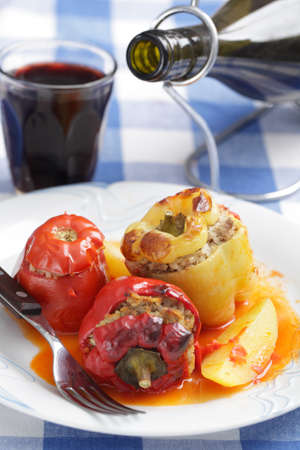 Peppers and tomato stuffed with mincemeatの写真素材