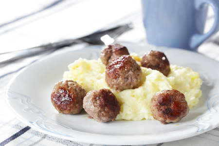 Meatballs with mashed potato on the plate closeupの写真素材