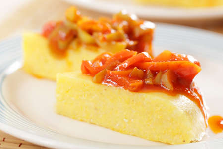 Polenta with pepper and tomato sauce closeupの写真素材