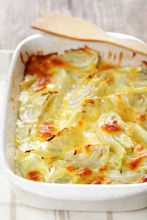 Fennel gratin in the white casserole closeupの写真素材
