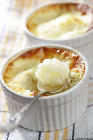 Rice pudding in the ramekin closeupの写真素材