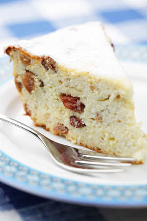 Cheesecake with raisins on the plate closeupの写真素材