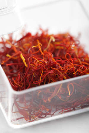 Dried saffron stigmas in the box closeupの写真素材