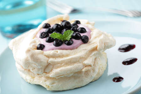 Pavlova dessert, meringue with blueberry and yogurtの写真素材