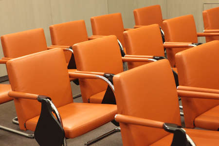 Rows of chairs in conference hall