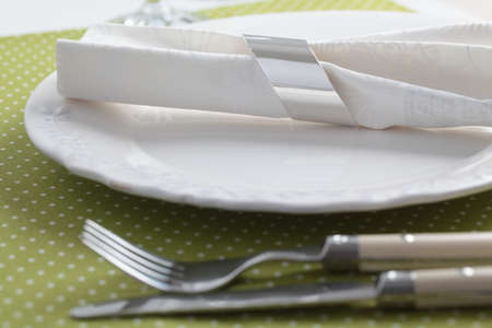 Elegant table setting with white napkinの写真素材