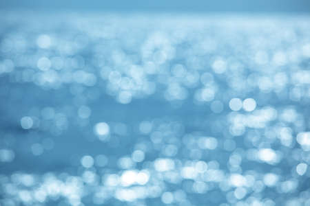 Defucused sea background with light effectsの写真素材