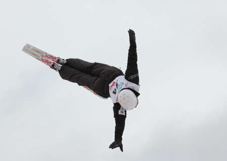 Bukovel, Ukraine - February 23, 2013: Naoya Tabara, Japan performs aerial skiing during Freestyle Ski World Cup in Bukovel, Ukraine on February 23, 2013.のeditorial素材