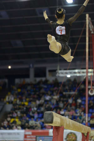 Kiev, Ukraine - March 31, 2013: Noda Sakura, Japan performs routine on balance beam during International Tournament in Artistic Gymnastics Stella Zakharova Cup in Kiev, Ukraine on March 31, 2013のeditorial素材