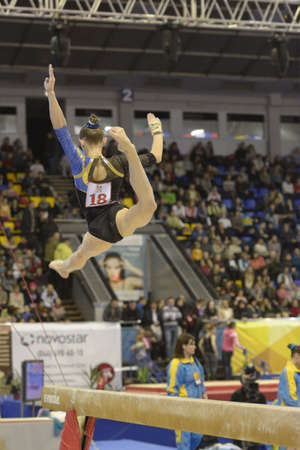 Kiev, Ukraine - March 31, 2013: Elena Vasilyeva, Ukraine performs exercise on balance beam during International Tournament in Artistic Gymnastics Stella Zakharova Cup in Kiev, Ukraine on March 31, 2013のeditorial素材