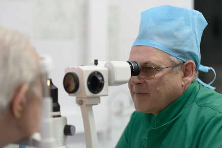 Moscow, Russia - April 10, 2013: Ophthalmologist examines the patient in the new policlinic in Moscow during press-tour guided by the prefecture of South-East Administrative District of Moscow on April 10, 2013 in Moscow, Russiaのeditorial素材