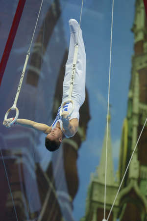 Moscow, Russia - April 20, 2013: Eleftherios Petrounias, Greece finished exercise on still rings in final of 5th European Championships in Artistic Gymnastics in Moscow, Russia on April 20, 2013のeditorial素材