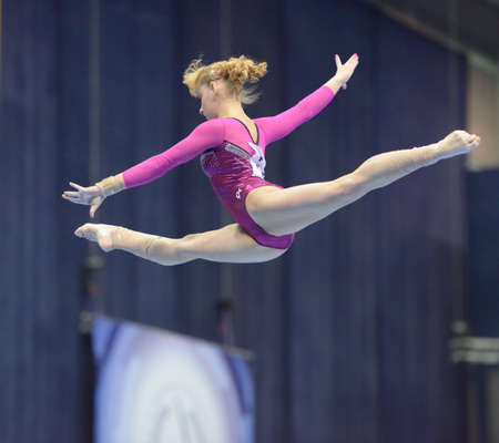 Moscow, Russia - April 21, 2013: Anastasia Grishina, Russia performs exercise on balance beam in final of 5th European Championships in Artistic Gymnastics in Moscow, Russia on April 21, 2013のeditorial素材