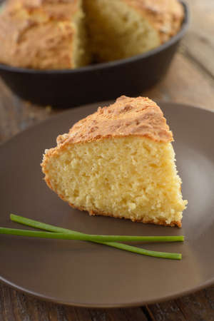 Just baked corn bread on a rustic table