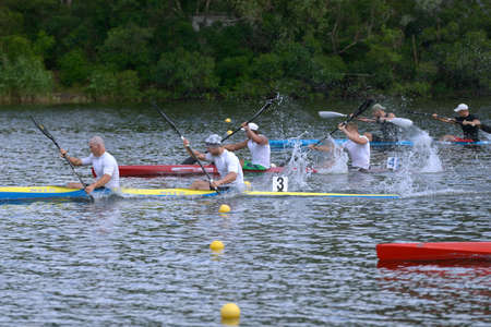 Dnepropetrovsk, Ukraine - May 29, 2013: Kayak racing during Ukrainian paddling championships in Dnepropetrovsk, Ukraine on May 29, 2013のeditorial素材