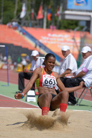 Donetsk, Ukraine - July 13, 2013: Kristal Liburd, Saint Kitts And Nevis, in long jump competitions during World Youth Championships in Donetsk, Ukraine on July 13, 2013のeditorial素材