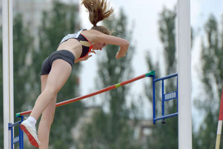 Donetsk, Ukraine - July 11, 2013: Ria Mollers of Germany competes in pole vault during 8th IAAF World Youth Championships in Donetsk, Ukraine on July 11, 2013のeditorial素材