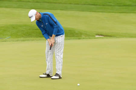 Moscow, Russia - July 27, 2013: Michael Hoey of Northern Ireland in action during 3rd round of the M2M Russian Open at Tseleevo Golf & Polo Club in Moscow, Russia on July 27, 2013のeditorial素材