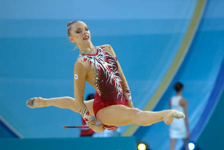 KIEV, UKRAINE - AUGUST 30, 2013: Melitina Staniouta of Belarus in action during the 32nd Rhythmic Gymnastics World Championships in Kiev, Ukraine on August 30, 2013のeditorial素材