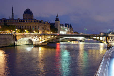 Night view of Notre-Dame bridge in Paris, Franceの写真素材