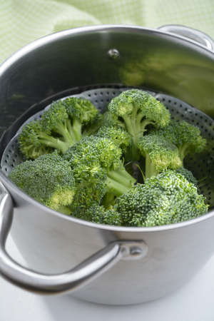 Broccoli in a steamer closeupの写真素材